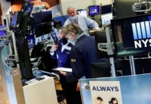 Wall Street cierra en verde tras datos de inflación más bajos y fuerte previsión de Micron