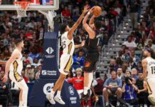 Booker conduce a Suns