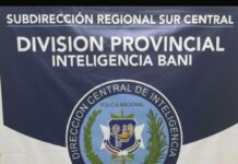 DINTEL y Ministerio Público ocupan pistola ilegal durante allanamientos en Baní