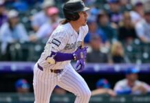 Grand slam de McCarthy por encima del poste salva a Rockies de la barrida