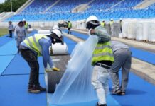 Inician instalación sintético de la pista de atletismo será la más moderna de América
